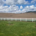 Hills And White Fencing